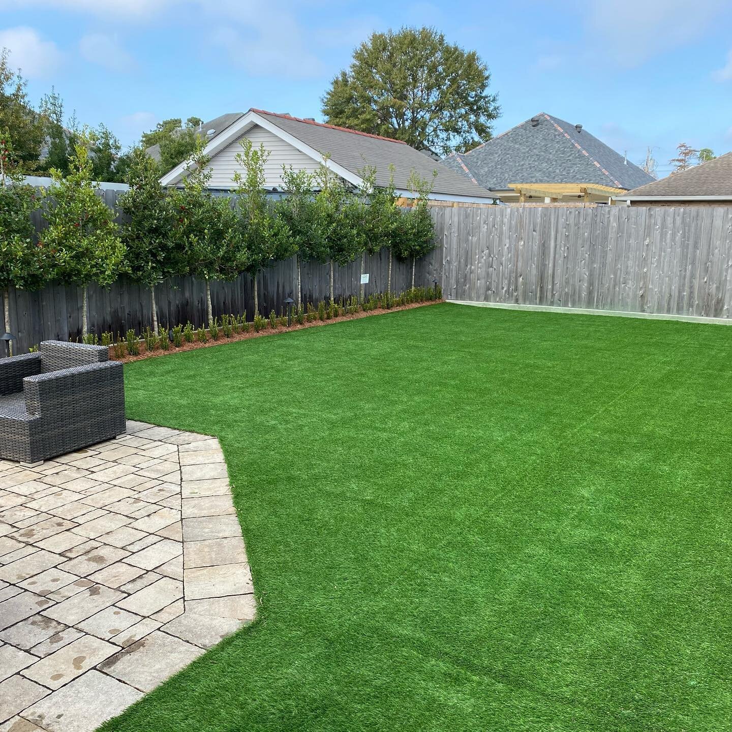 Complete backyard transformation with artificial turf installation in The Lakes at Ranch